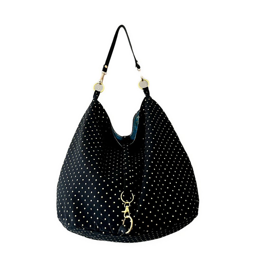 Beautiful black, gold and blue reversible bag