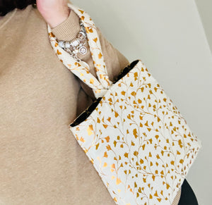 Chic, gold wristlet