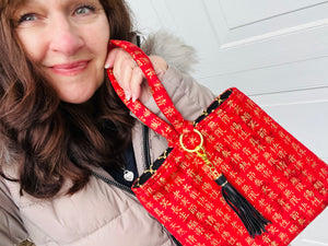 Beautiful red and gold wristlet